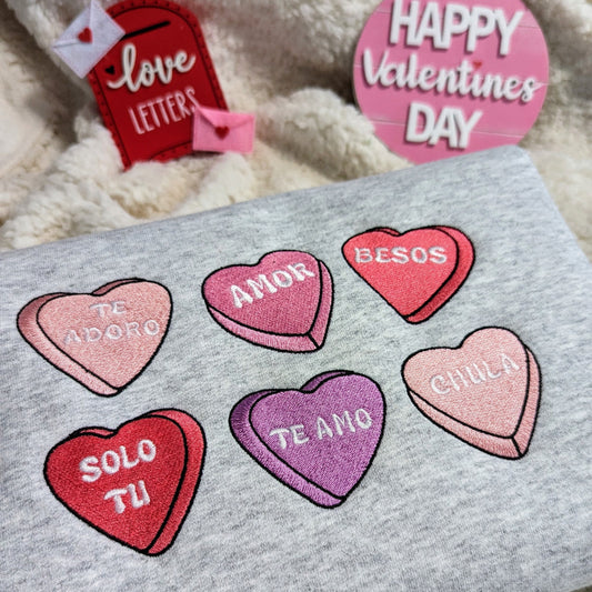 Embroidered Spanish Conversation Hearts Sweatshirt